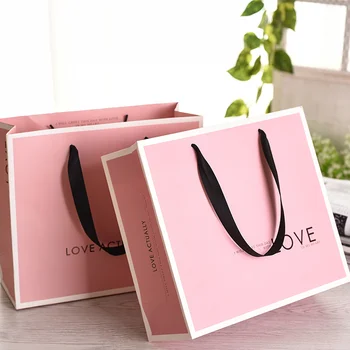 500 бр., луксозен подарък на известната марка, отпечатани на поръчка розови хартиени торби за пазаруване с вашето собствено лого, чанта за опаковане на бижута Изображение
